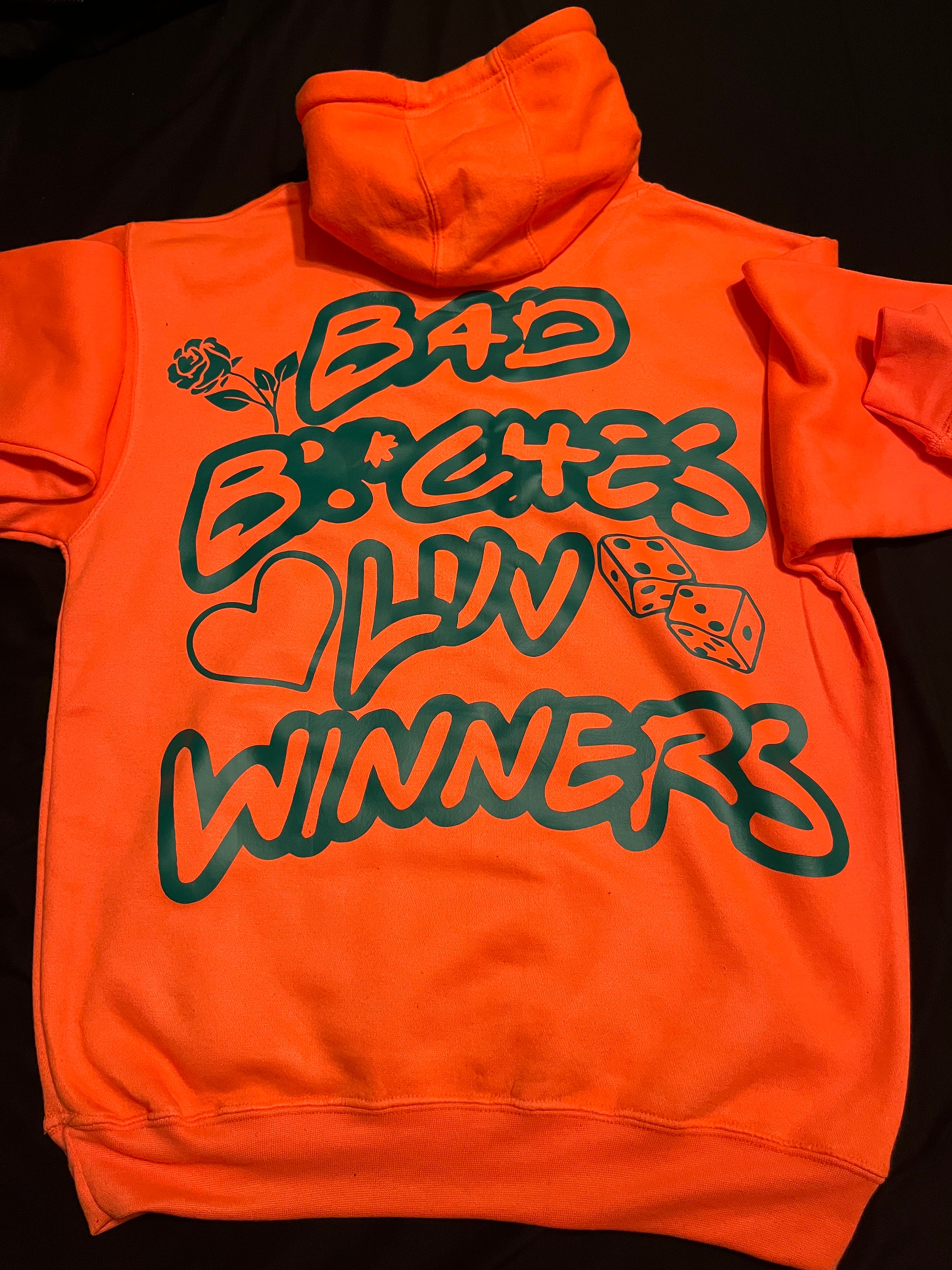 Green and top orange hoodie
